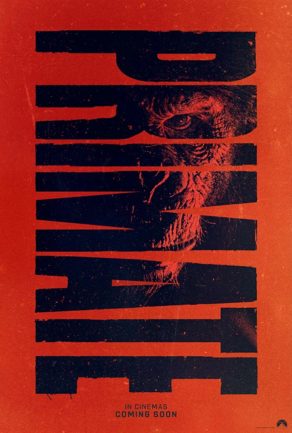 Promotional poster for a horror movie PRIMATE featuring a close-up of a face of a chimpanzee, partially obscured by black horizontal bars of the title PRIMATE, with the text 'IN CINEMAS COMING SOON' at the bottom.