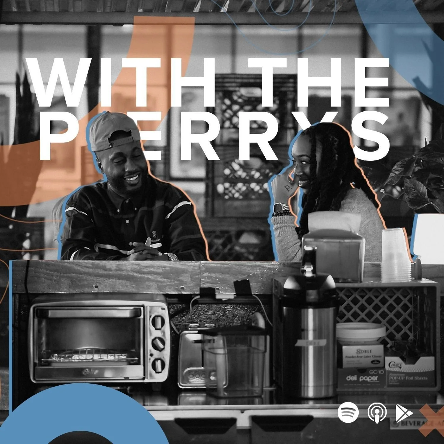 A black and white photo of two people sitting at a counter inside a cafe or restaurant, smiling and engaging in conversation, with the text "With the Purrys" overlaid.