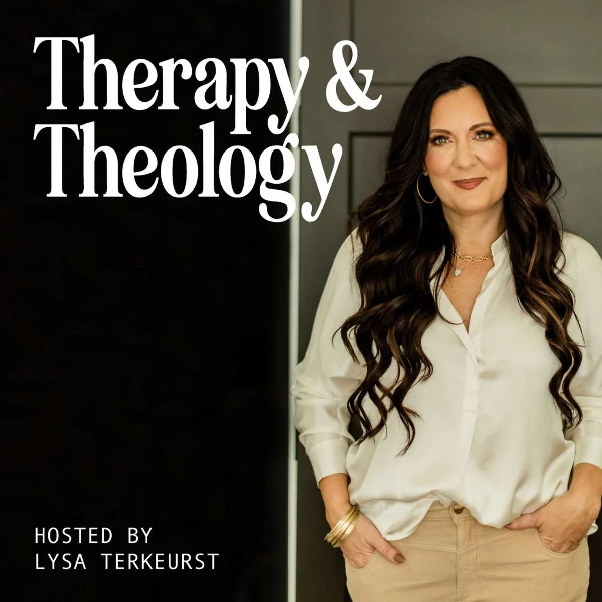 A woman with long dark wavy hair, wearing a white blouse and beige pants, standing with her hands in her pockets. Text overlay says 'Therapy & Theology' and 'Hosted by Lysa Terkurst'.
