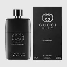 A black bottle of Gucci Guilty perfume next to its black box packaging with the Gucci logo and product information.