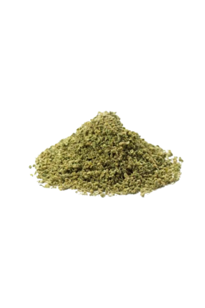 Pile of ground green herb, possibly cannabis or similar plant material.