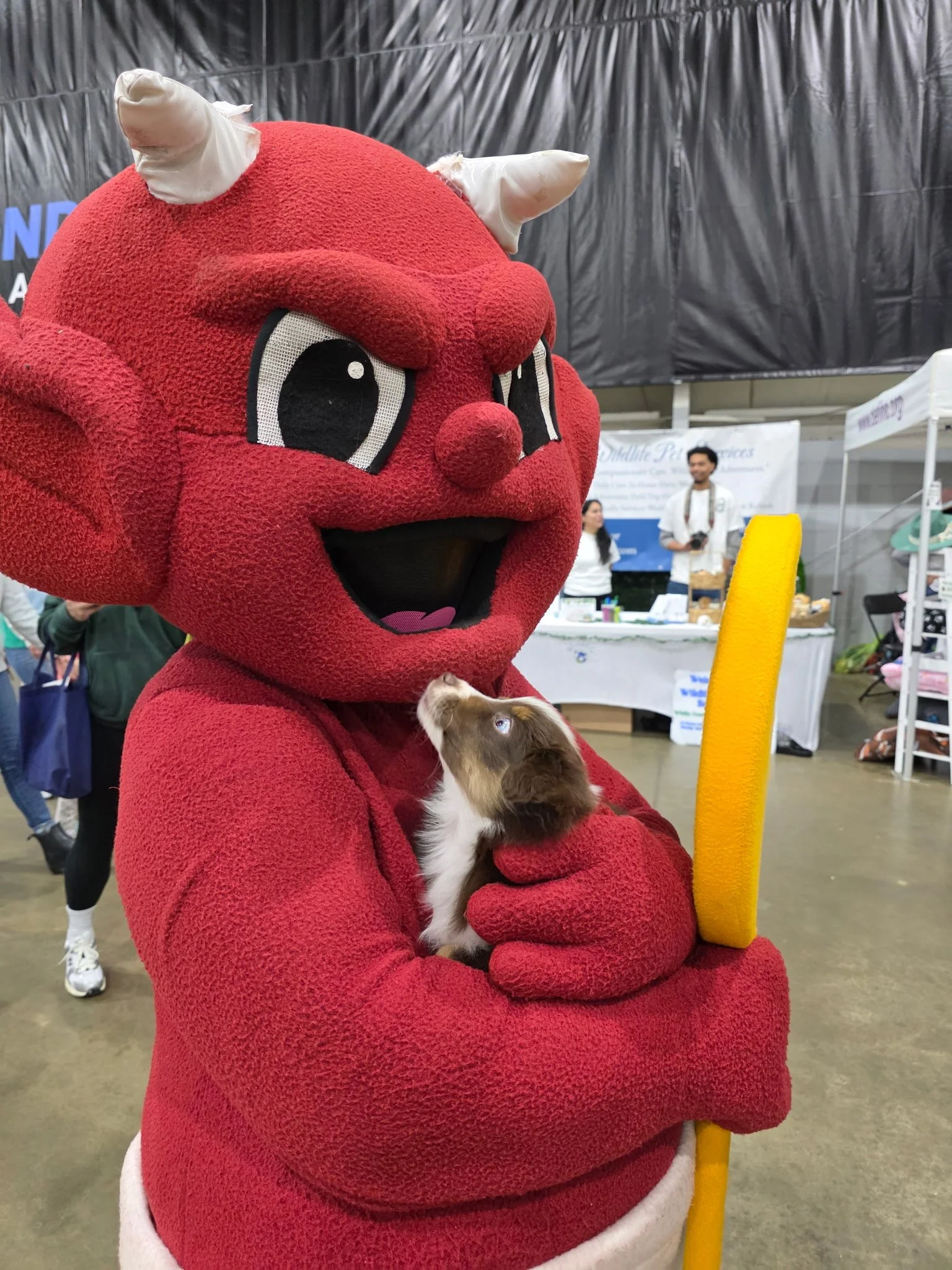 Copy of Torchys Mascot with Pup.JPG