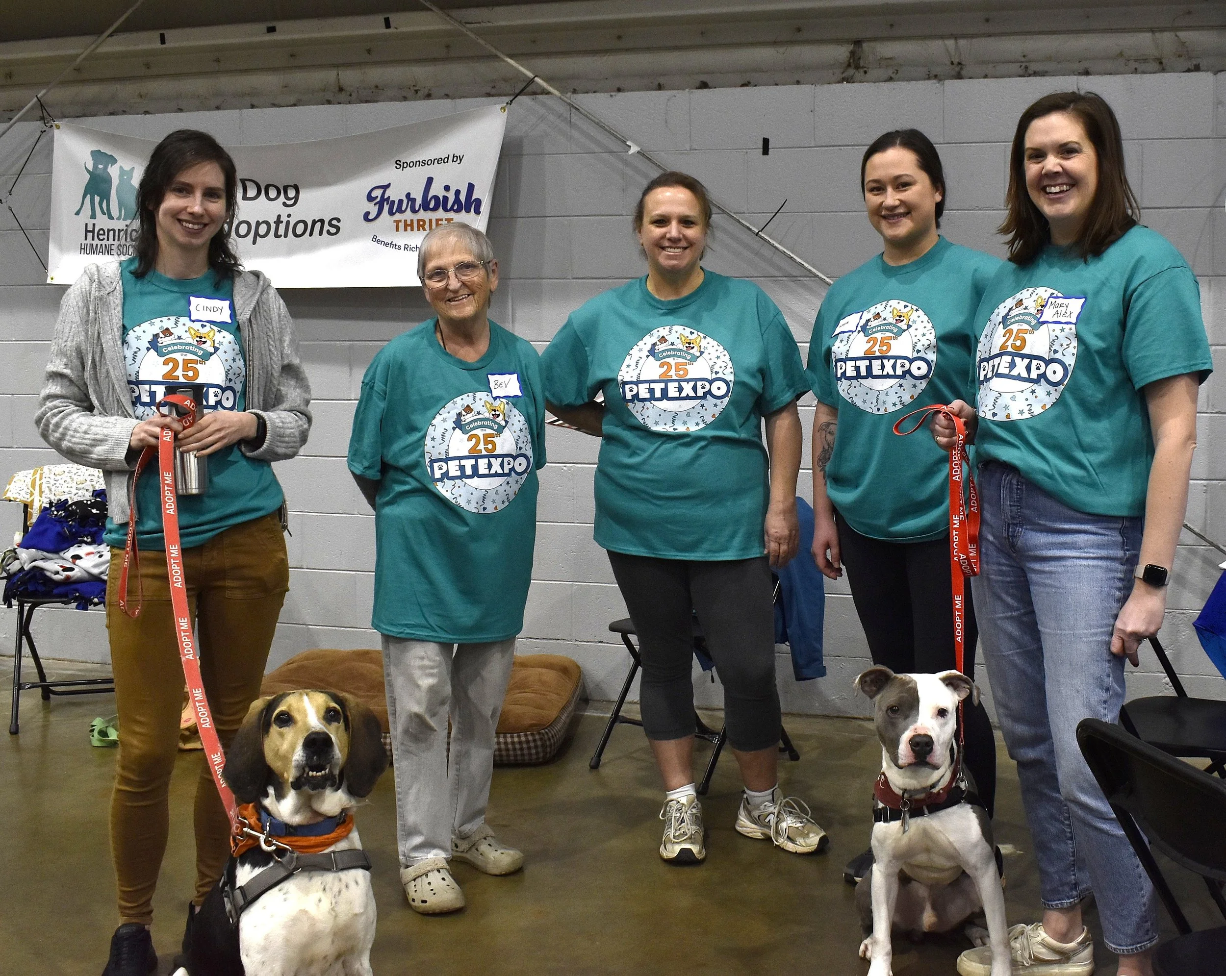Copy of Adoption Stand Volunteers at Expo 2026.JPG