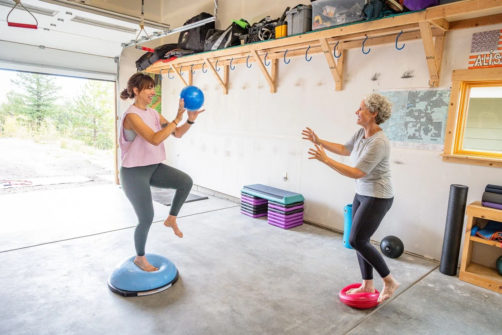 Two women playing a balance game