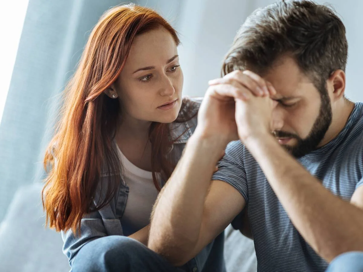 Partner shutting down during conflict, appearing overwhelmed and withdrawn