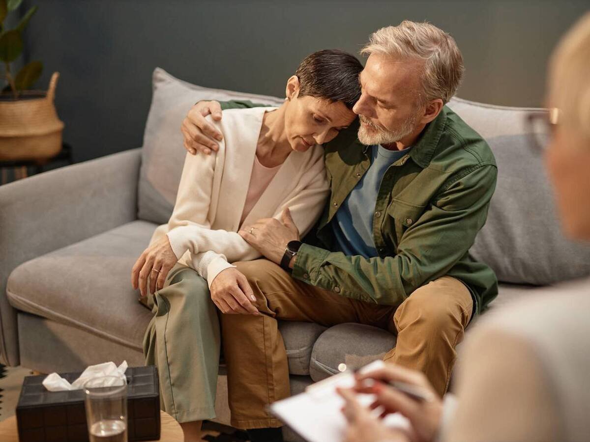 Couple reconnecting emotionally after conflict during couples therapy in Maryland