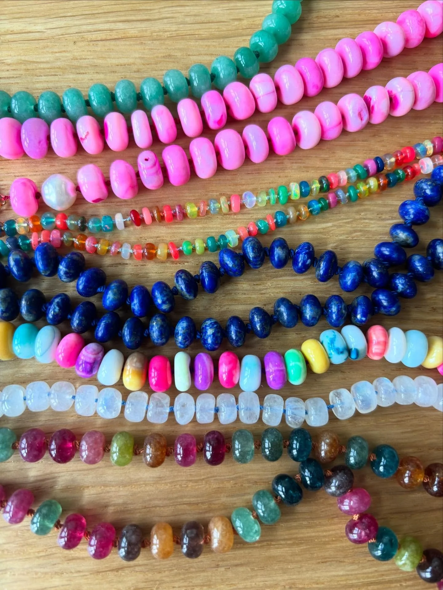 Hand knotted silk cord with tourmaline, selenite, opal, lapis, and aventurine rondelles