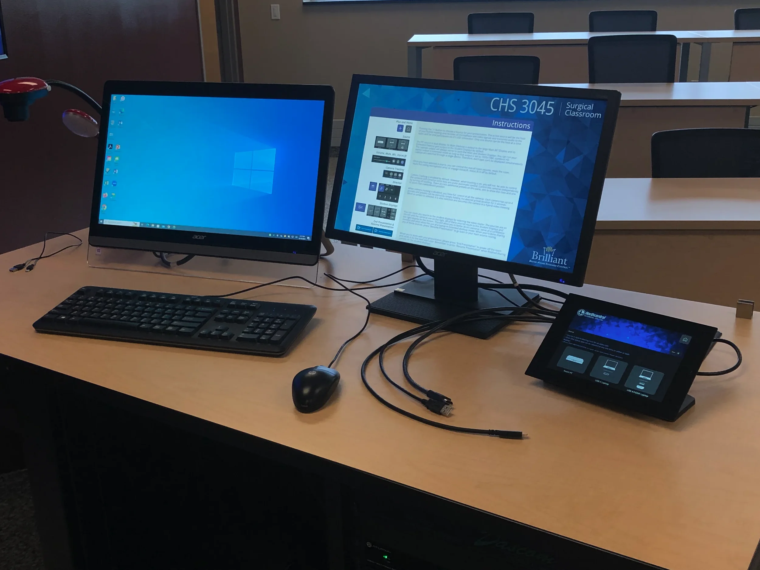 conference room with integrated AV control system and touch panel interface