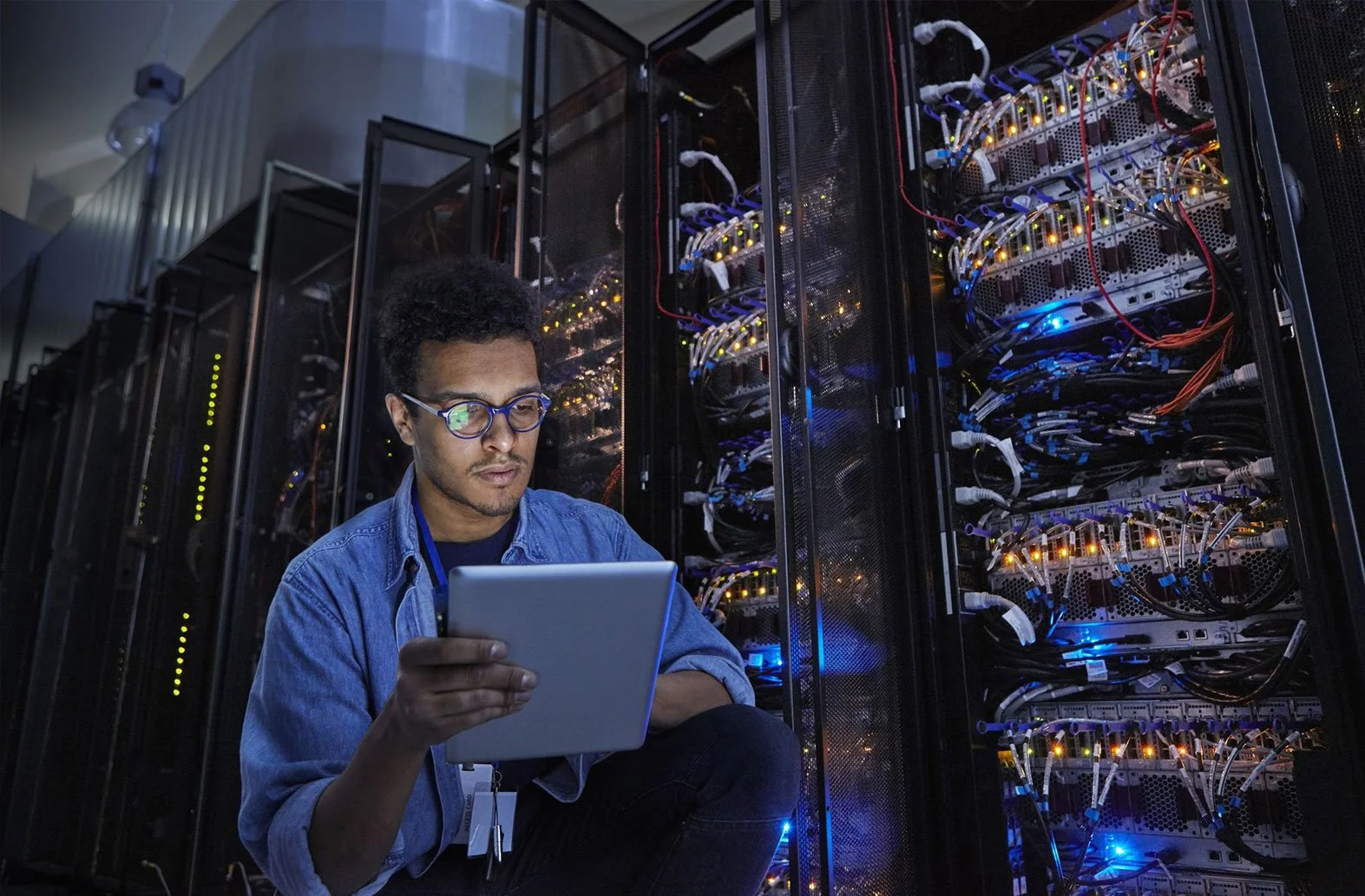 IT professional managing secure server infrastructure in data center environment.