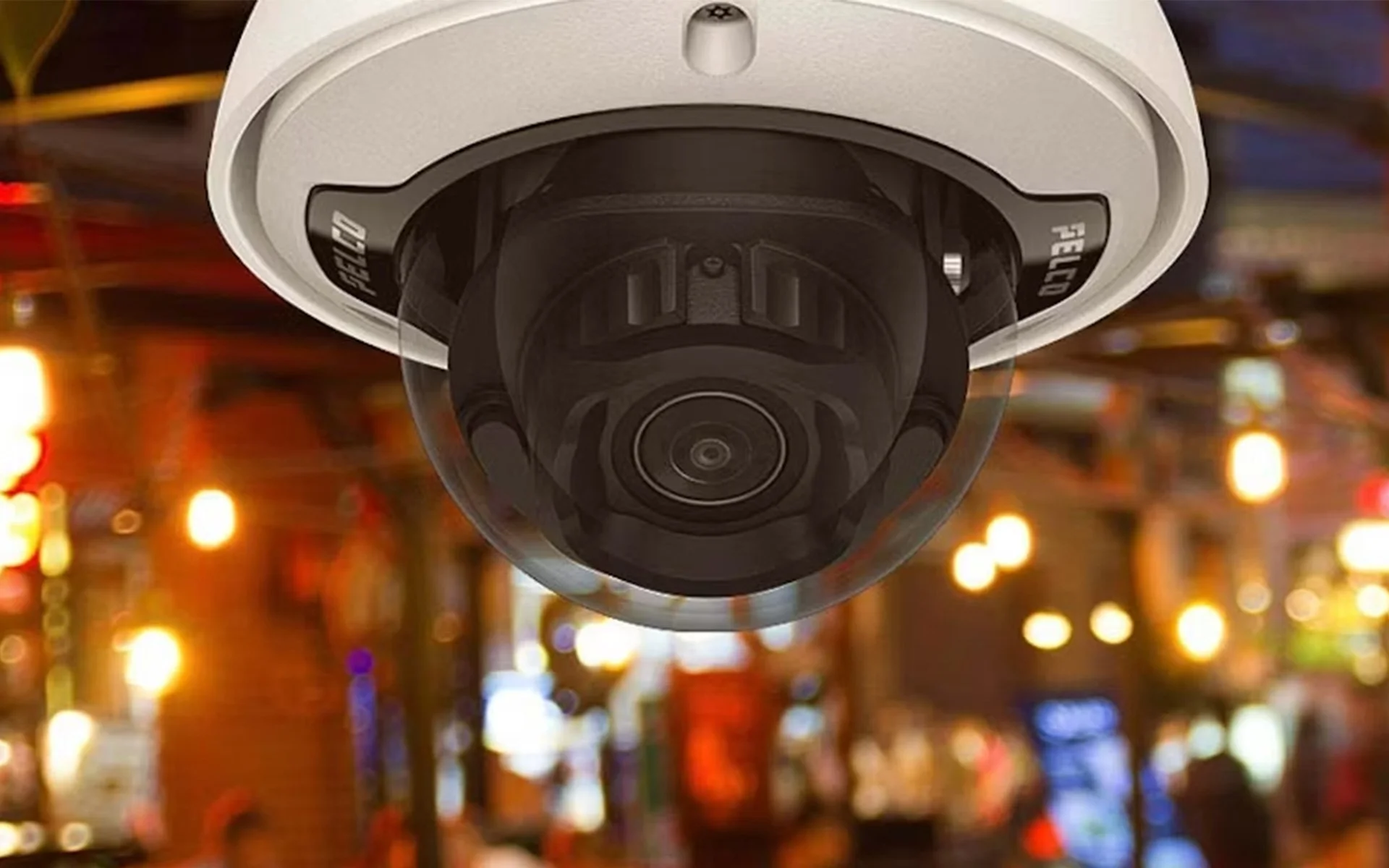 Pelco dome security camera installed in urban New York City environment demonstrating professional surveillance system installation across the metropolitan area