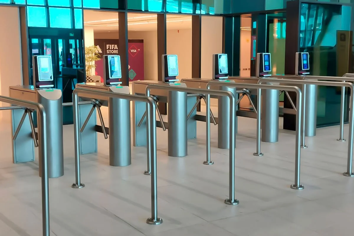 Turnstile access control system managing crowd entry at a sports or entertainment venue to ensure secure and organized access.