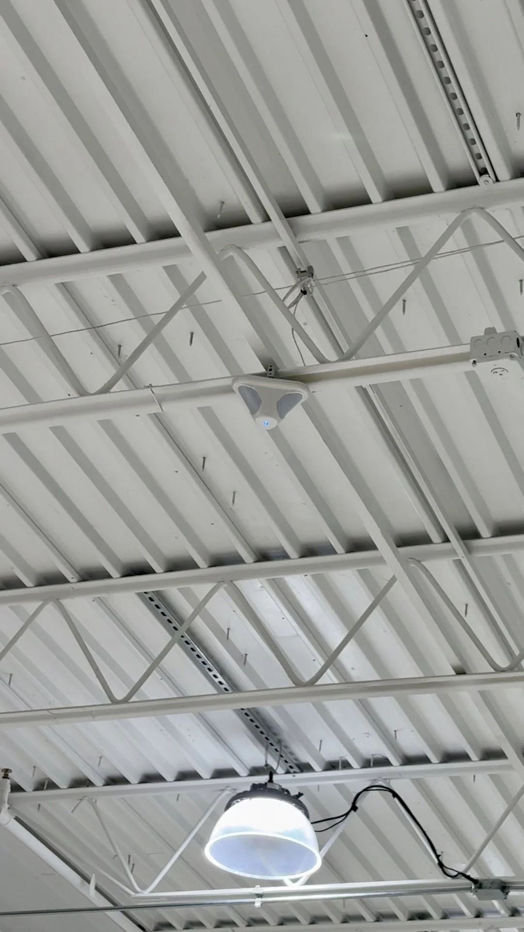 Commercial warehouse motion sensor bosch mounted to ceiling