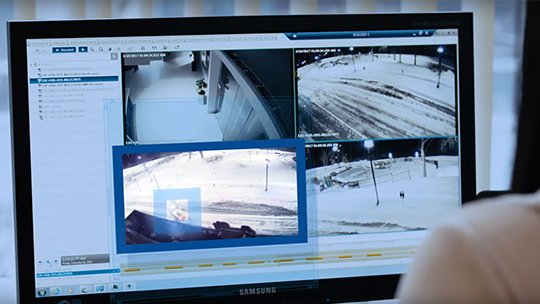 Motorola Solutions video security analytics software analyzing multiple surveillance camera feeds on a monitoring workstation.
