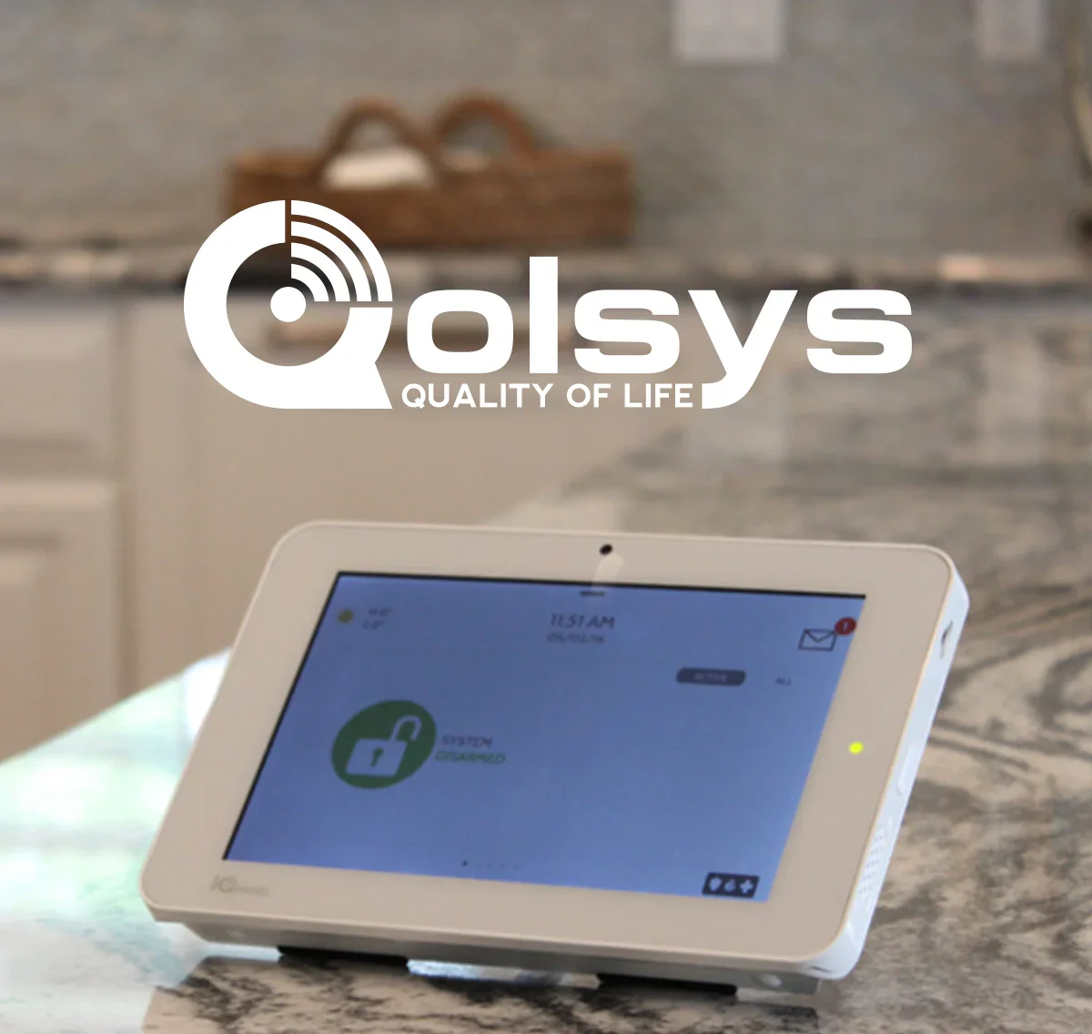 Qolsys smart alarm panel replacing outdated security system in modern property