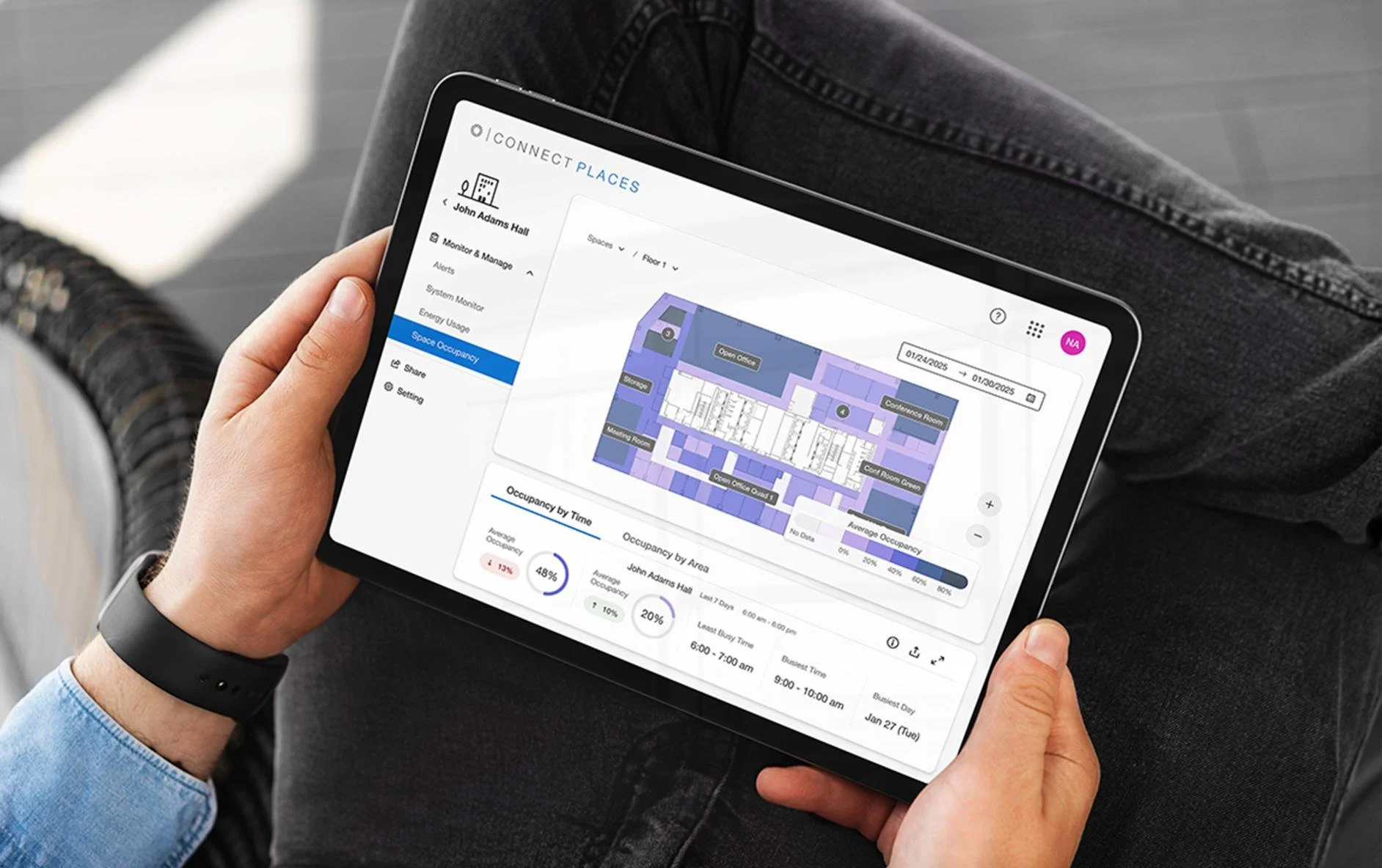 Tablet displaying a smart building dashboard used for programming lighting scenes and managing automated lighting systems.