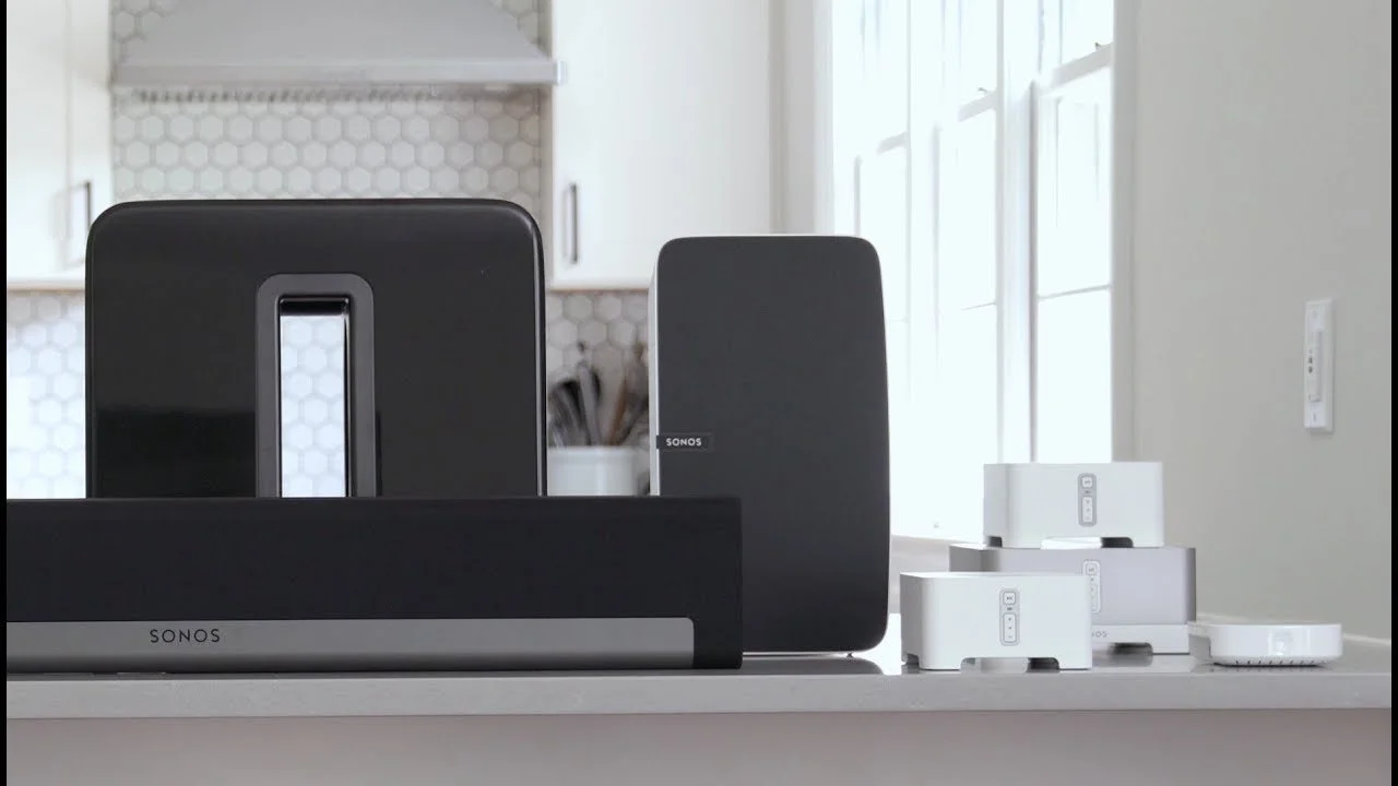 Sonos architectural audio system integrated into modern kitchen and living space
