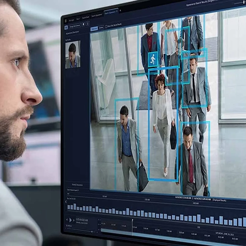 Security operator monitoring real-time video analytics with people detection, enhancing situational awareness in a place of worship.