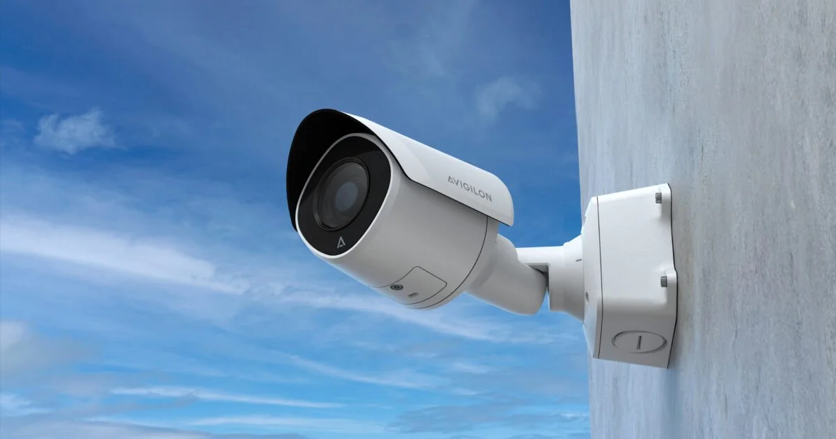 Avigilon bullet security camera installed on an exterior wall for outdoor video surveillance.