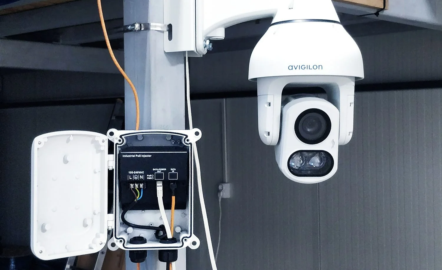 Avigilon security camera installed on a commercial property as part of a professional surveillance system deployment.