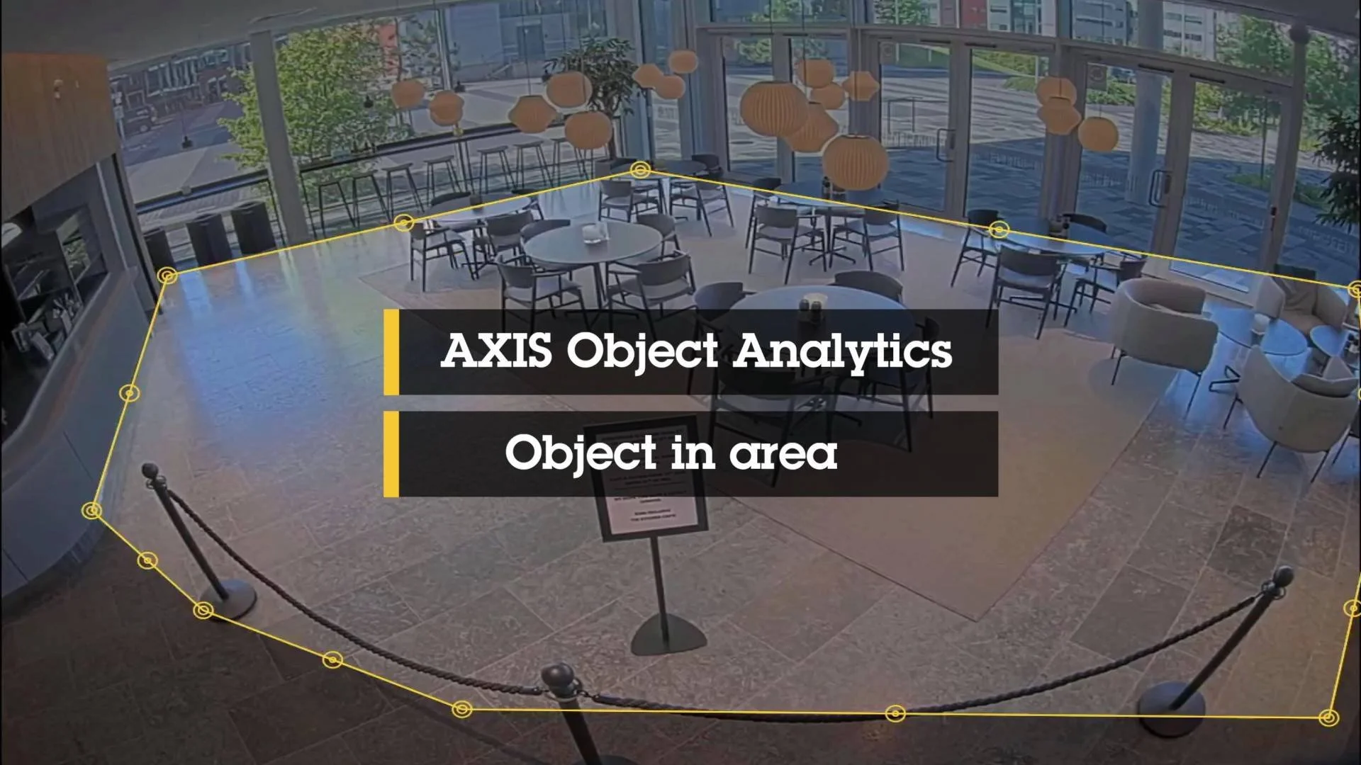 Axis AI object analytics detecting movement within a defined area using intelligent video surveillance software.