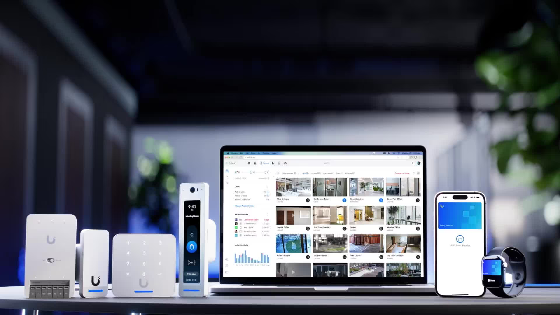 Modern access control system with mobile entry, dashboard monitoring, and door readers in commercial building
