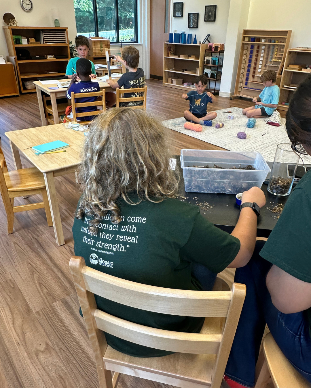 Elementary students participating in an uninterrupted work cycle in The Grove at The Mosaic Field School.