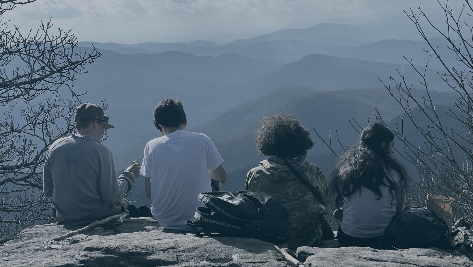 Suwanee middle and high school students in nature-based Montessori real-world program on a mountain after a hike