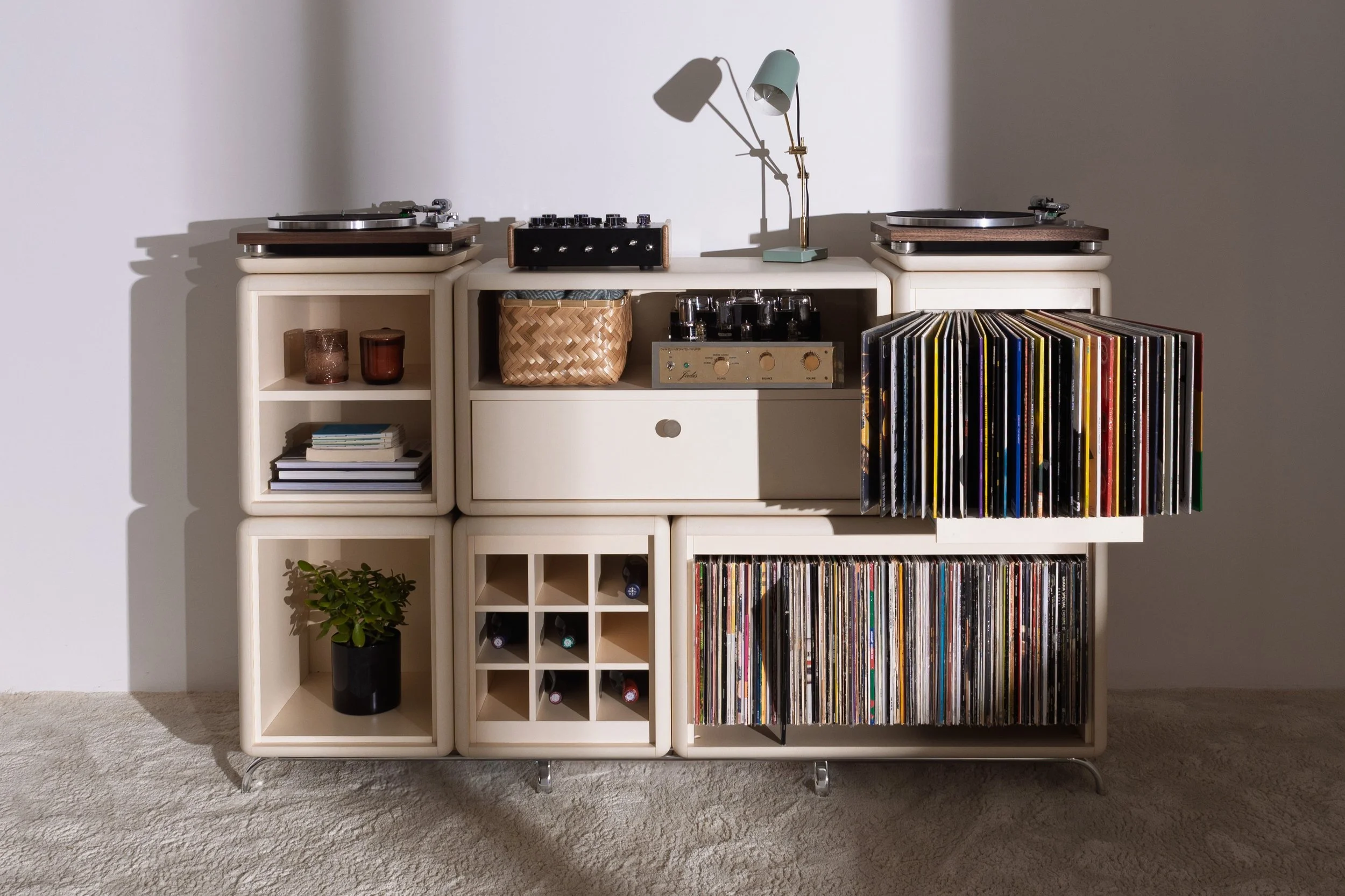Groovaly Wilson Golden Age with records, two turntables and storage for hi-fi equipment.