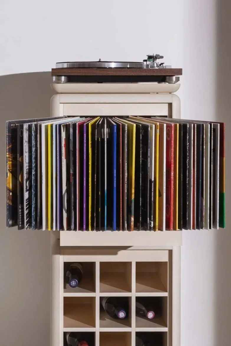 Bloom vinyl browsing element in White Pearl with fan drawer open, integrated into the Sly vinyl furniture composition — Groovaly