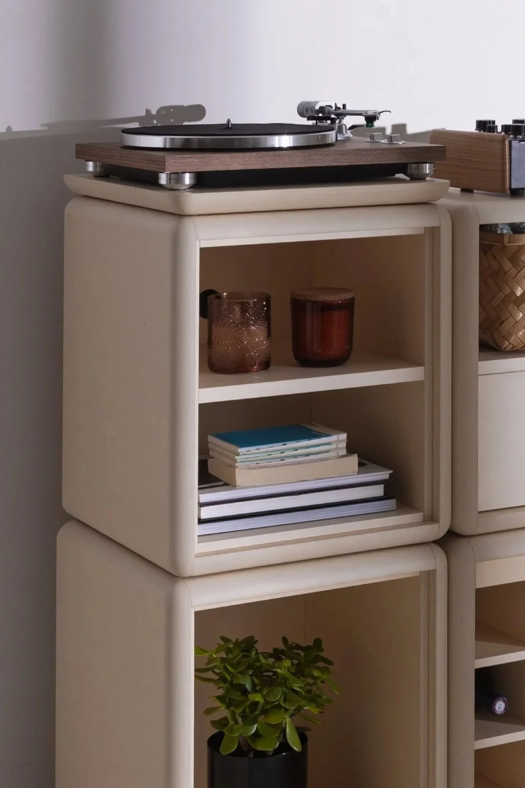 Split module in White Pearl, filled with various objects, as part of the Wilson vinyl furniture — Groovaly