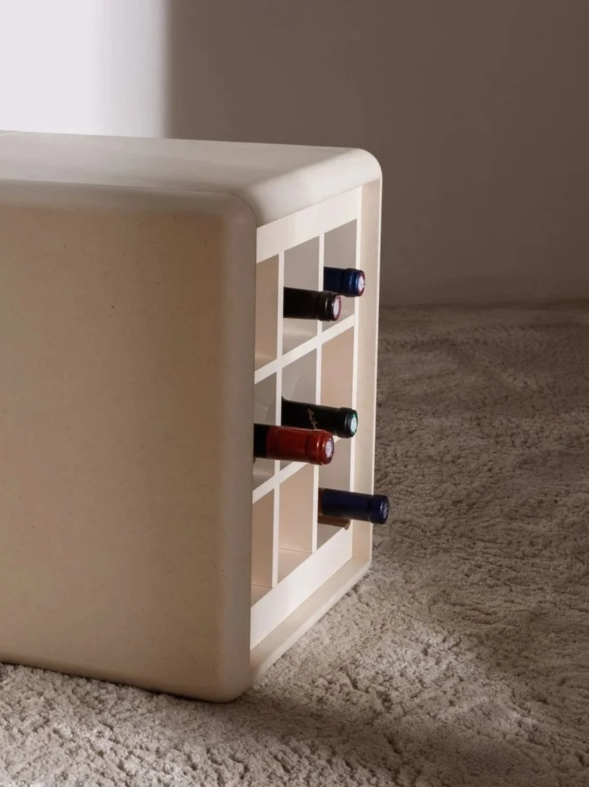 Grid wine storage element in White Pearl filled with bottles within a Groovaly furniture composition — Groovaly