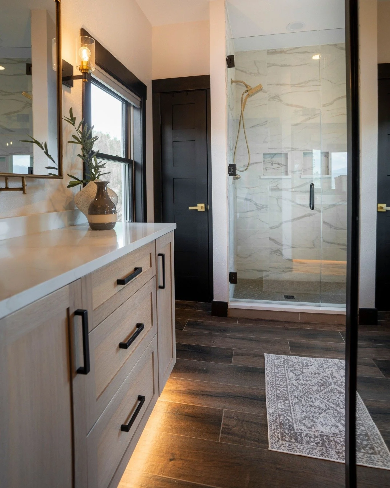 A little glow goes a long way.✨ Under-cabinet lighting that highlights every detail, especially those floors.

.
.
 #updateyourhome #bathroomremodel #bathroomdesign