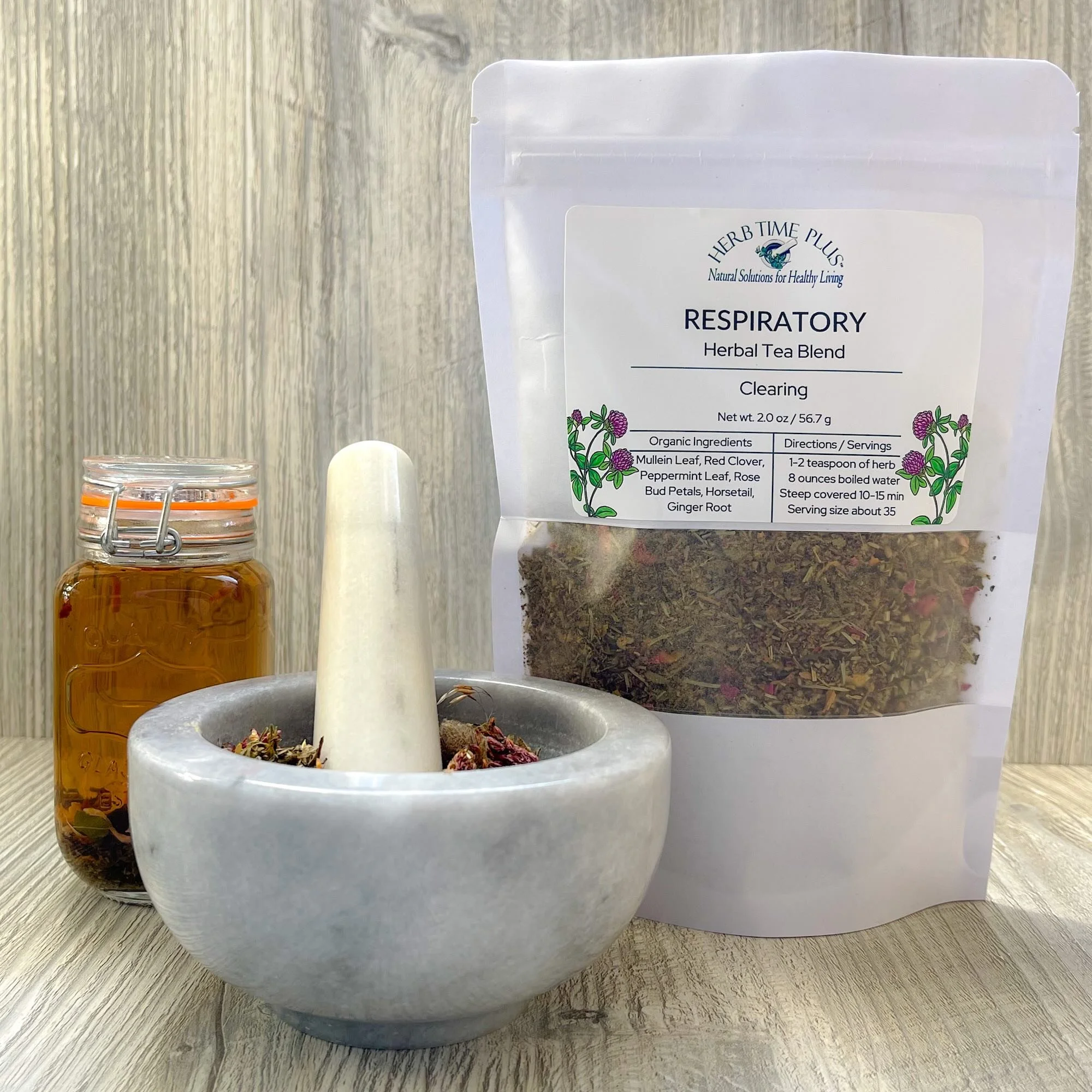respiratory-herbal-tea-blend-product-display.jpeg: respiratory tea blend with bag, loose herbs and brewed tea