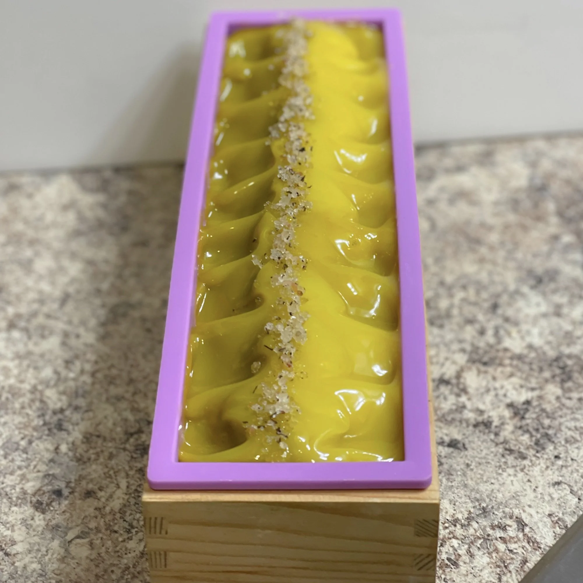spring-morning-soap-full-mold.jpg: wet spring morning soap in a soap mold at a distance