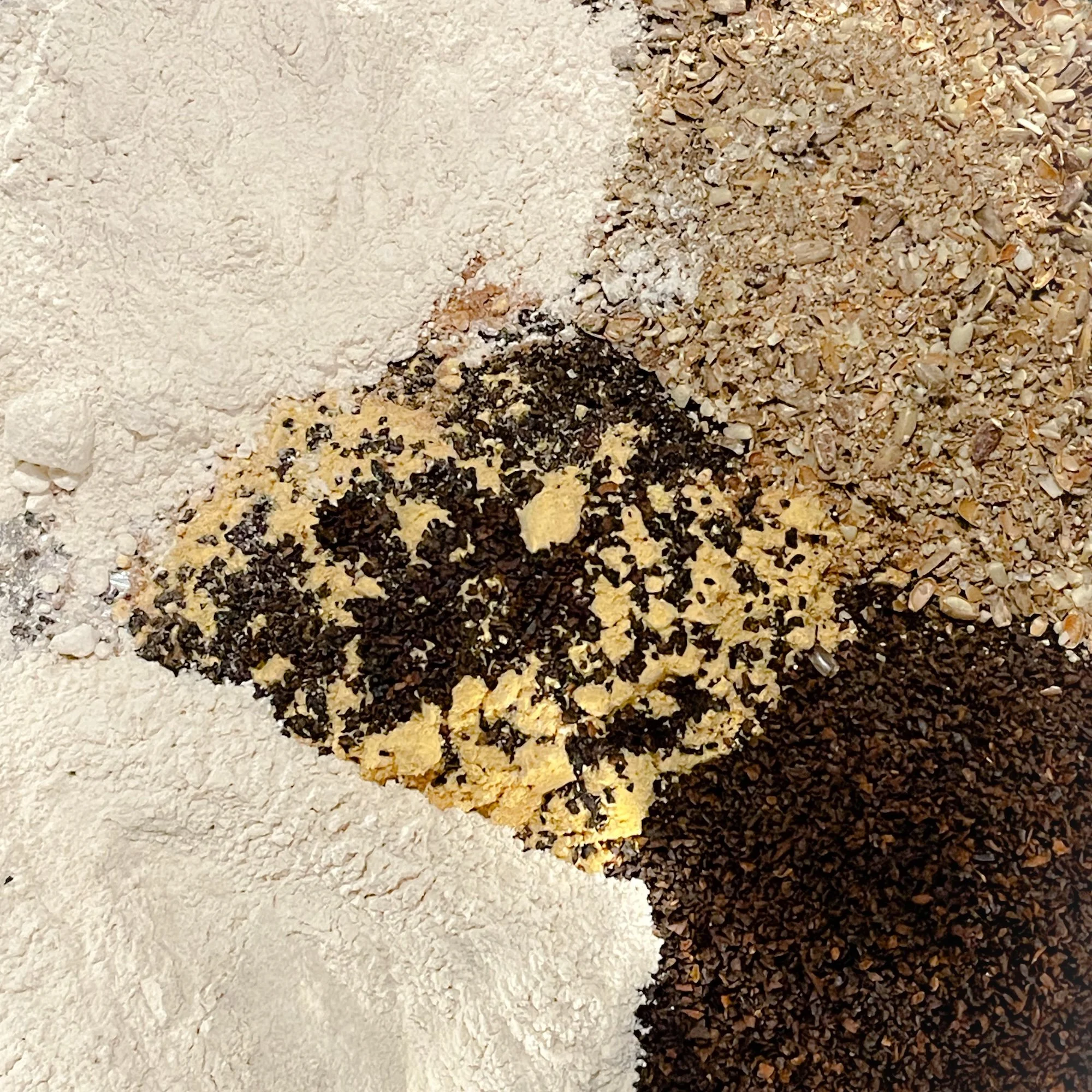 liver-support-tea-blend.JPEG:individual loose herbs in a bowl before blended