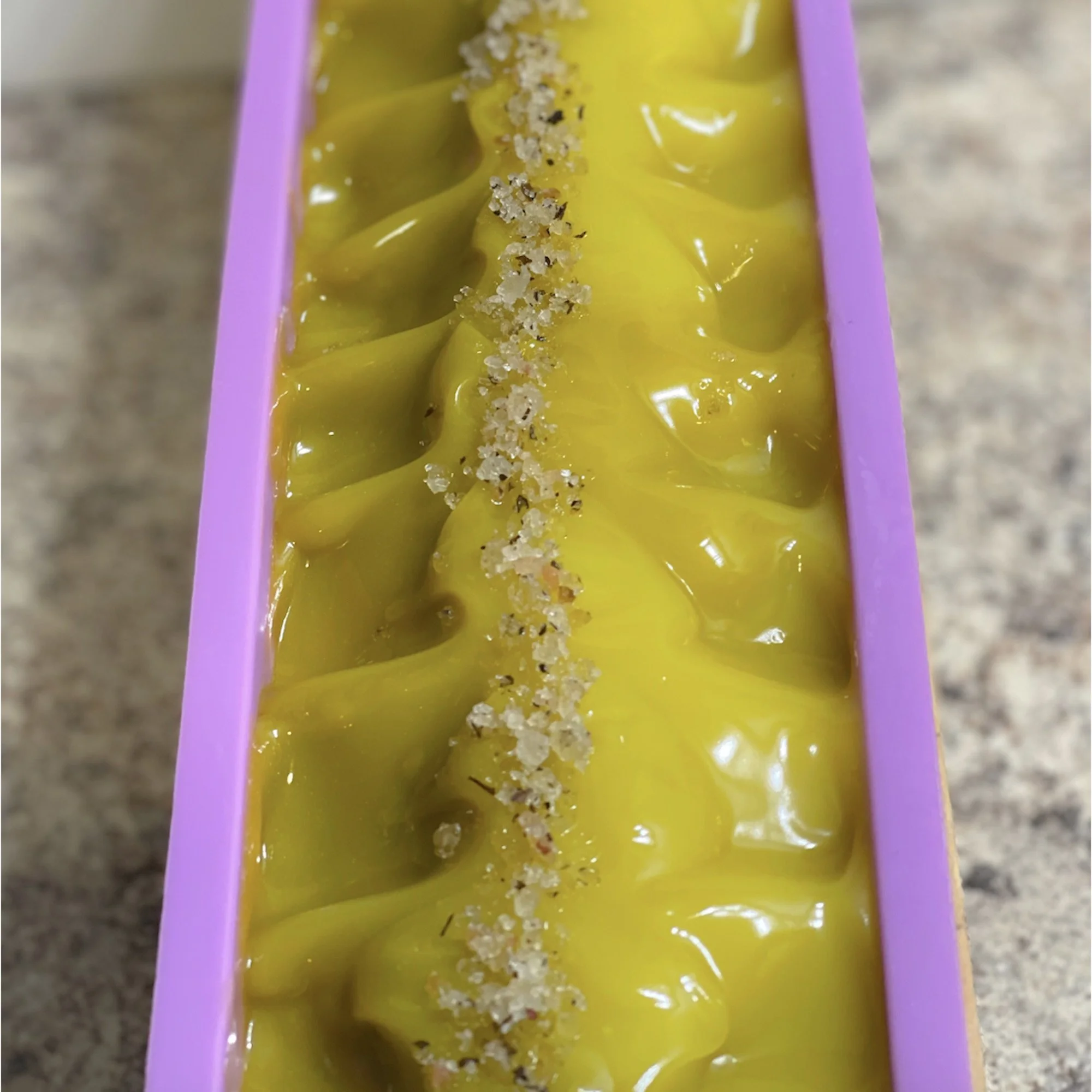 spring-morning-soap-wet.jpg: wet close up view of spring morning soap in soap mold