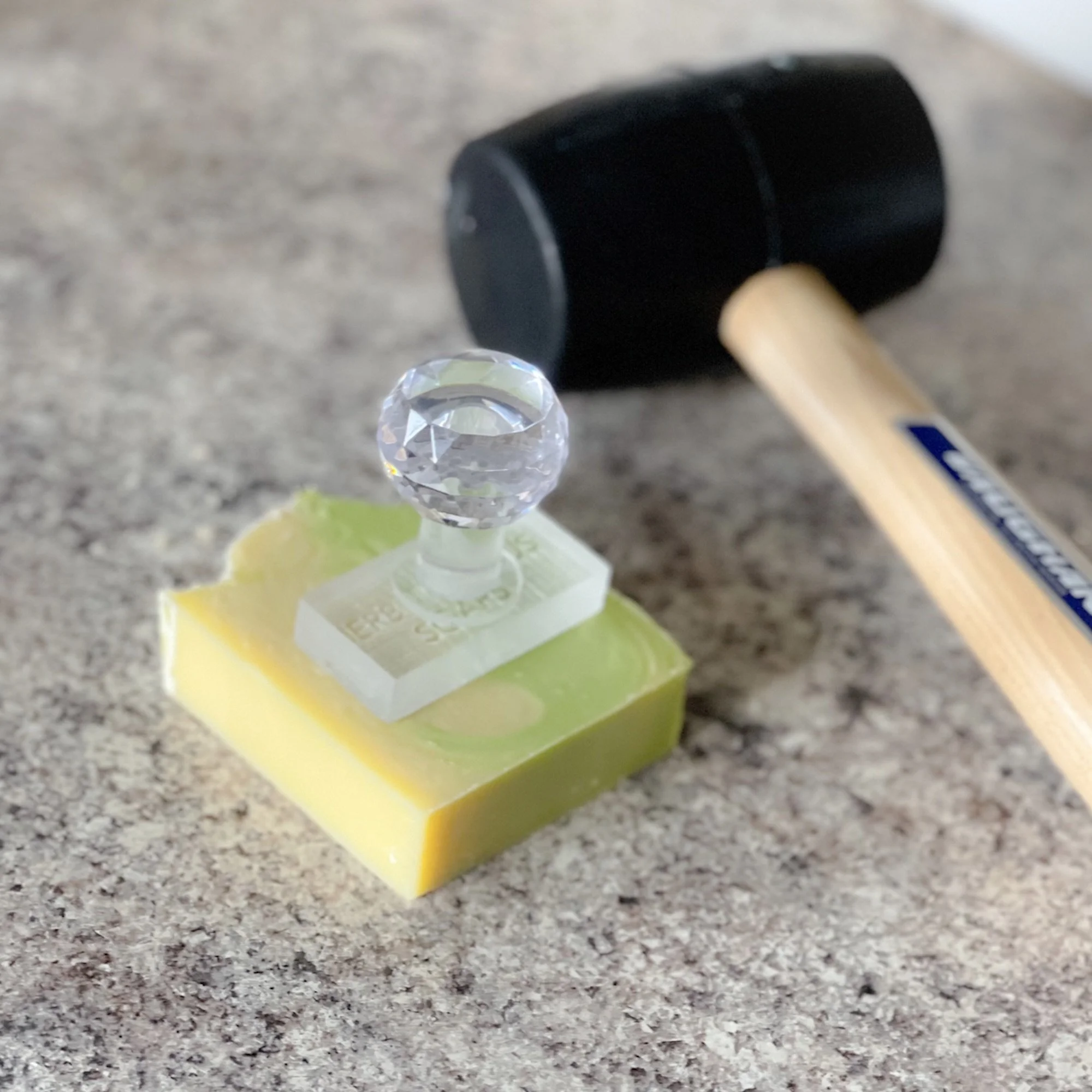 spring-morning-soap-stamp.jpg: spring morning soap with a soap cutter and mallet