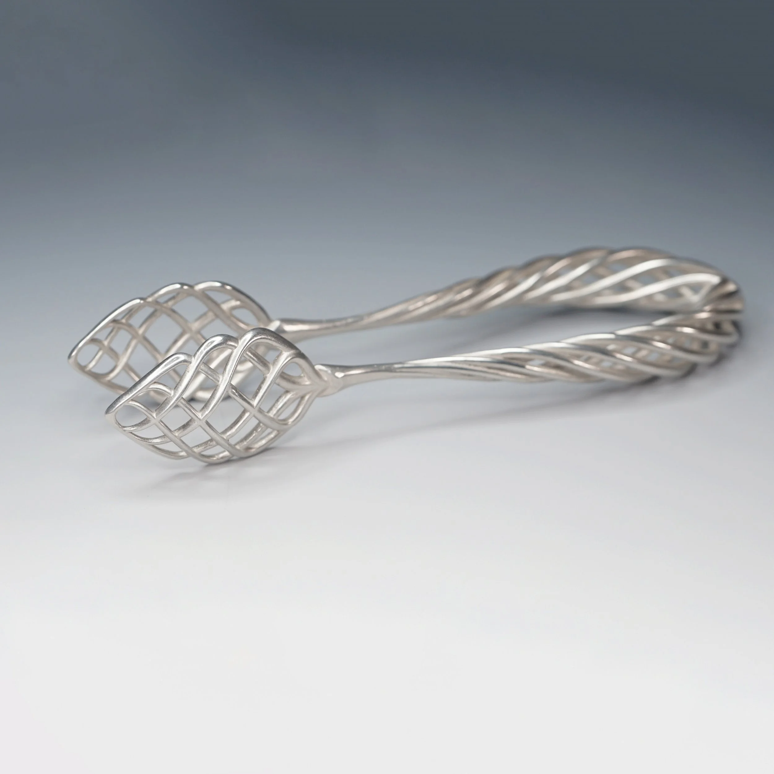 tongs_helix_1x1.jpg