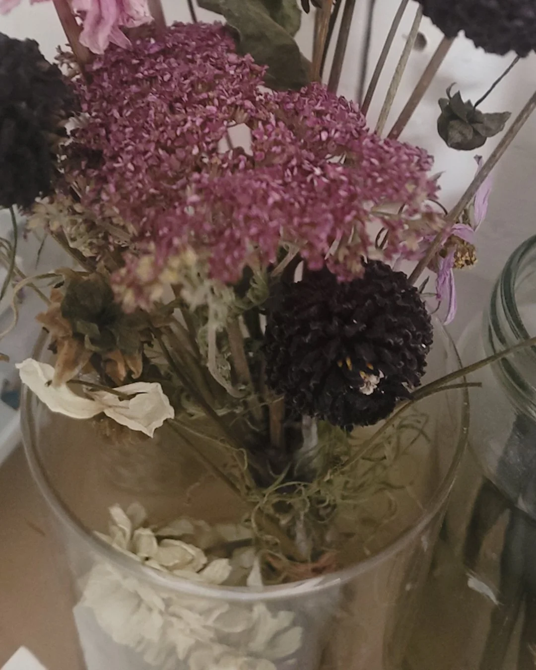  arranged a few dried flowers 