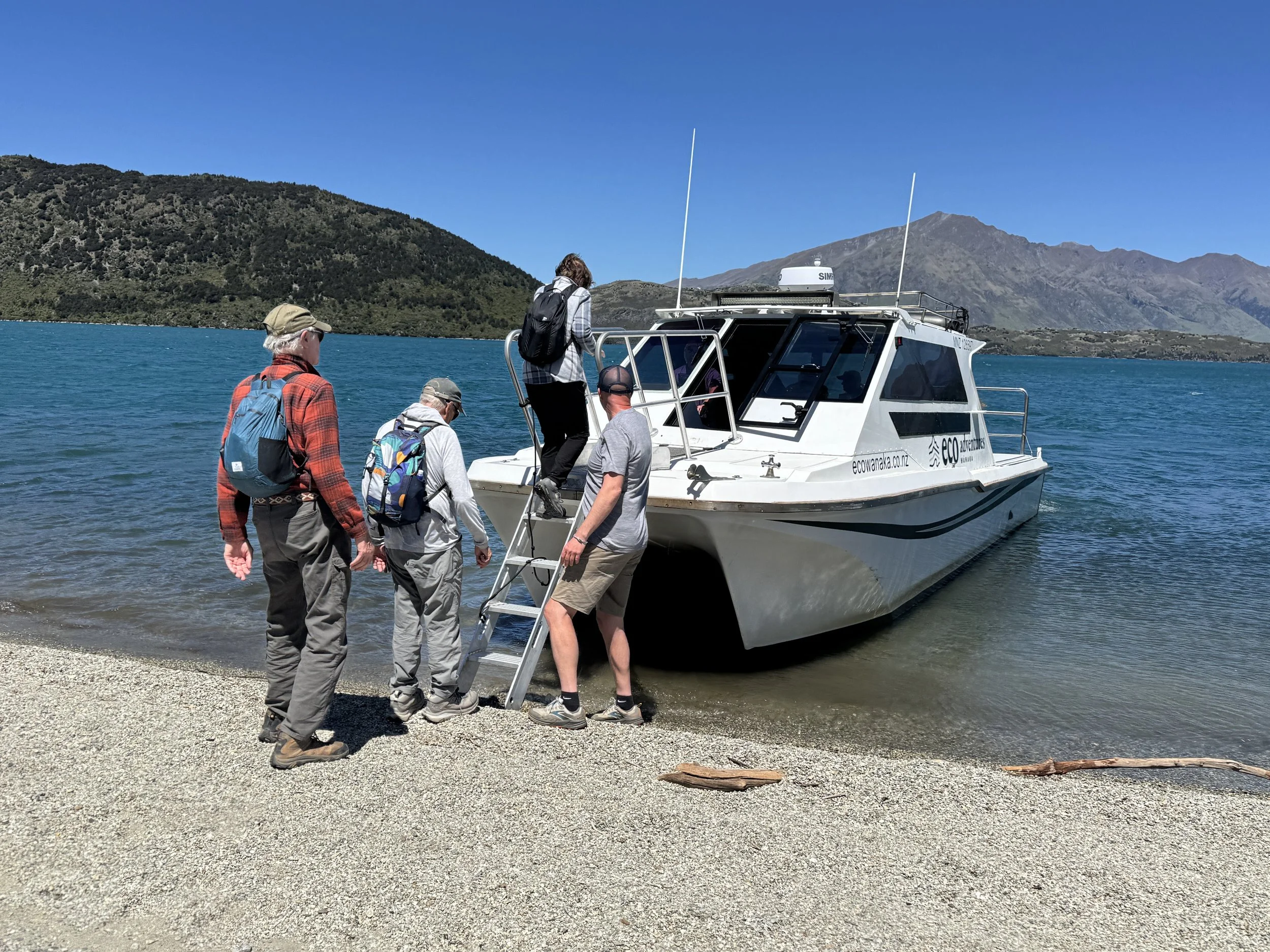 Wānaka Nature Encounter - Boat pickup from beach.jpeg