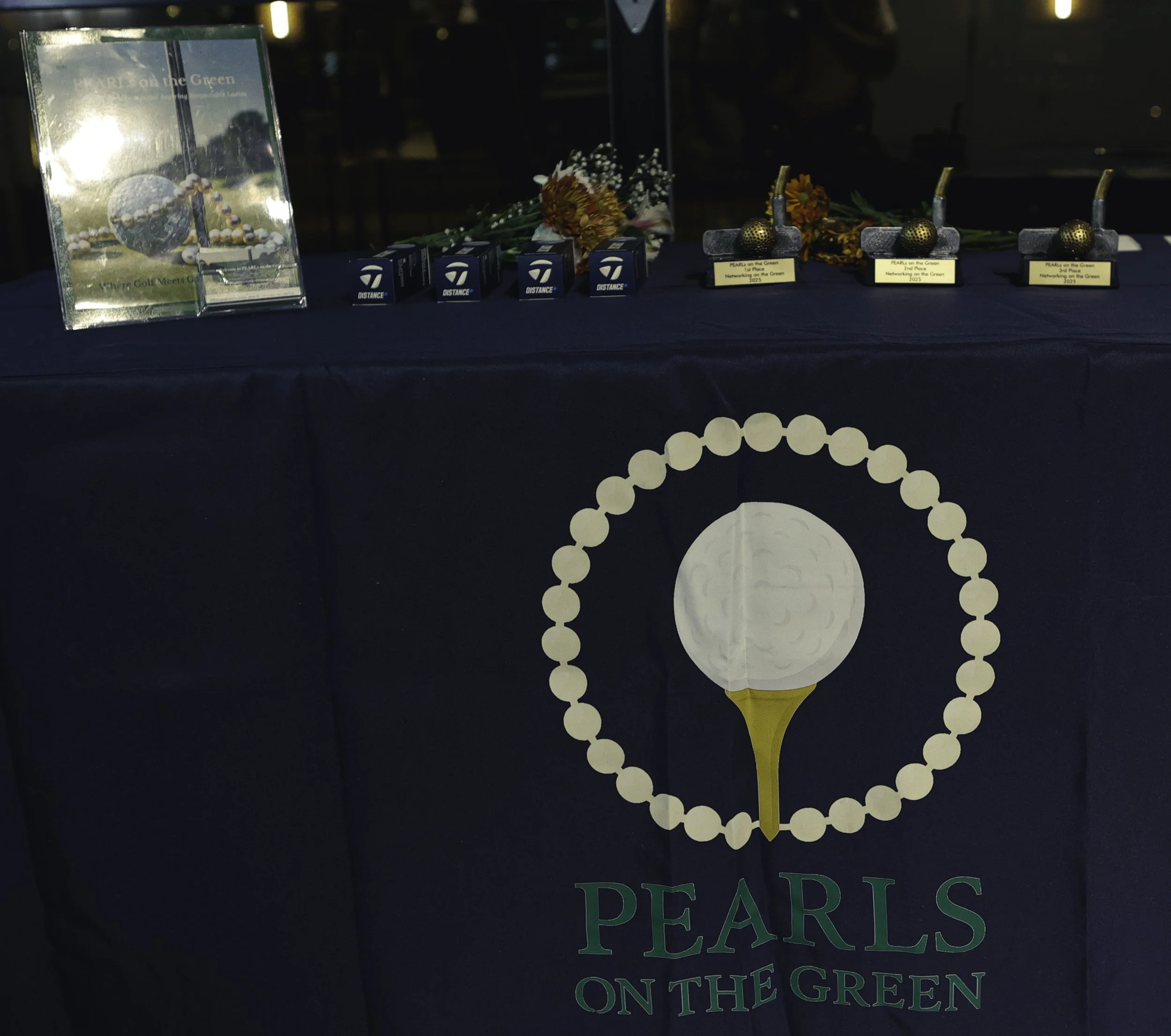 pearls logo and table setup.jpeg