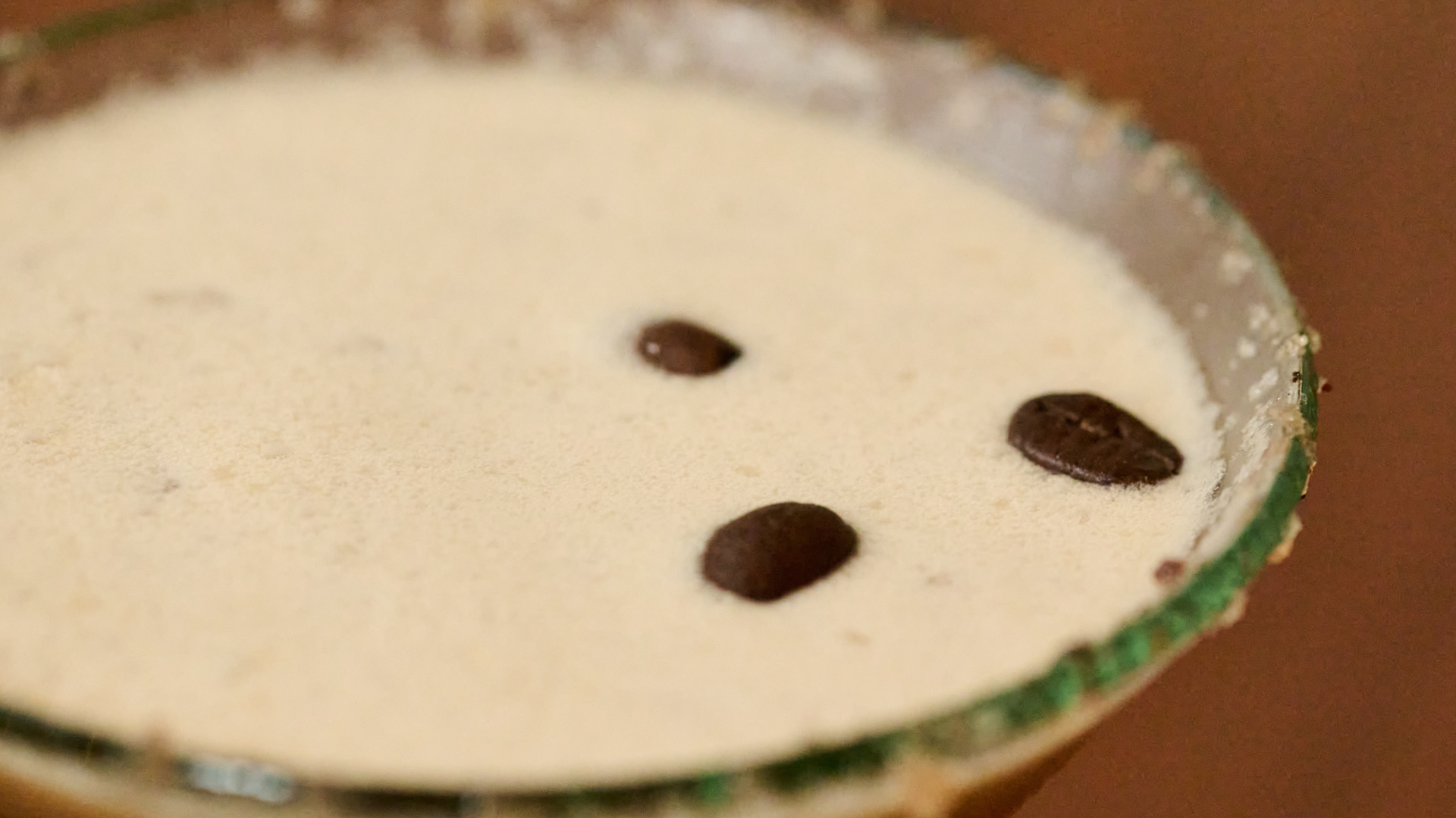 Tropic Java  NC Cap & Cane Coffee Rum, Frangelico, house-made
cinnamon vanilla simple syrup, &  coconut cream. Served up with a Sea Love Cinnamon Salt rim. Garnished with coffee beans.
