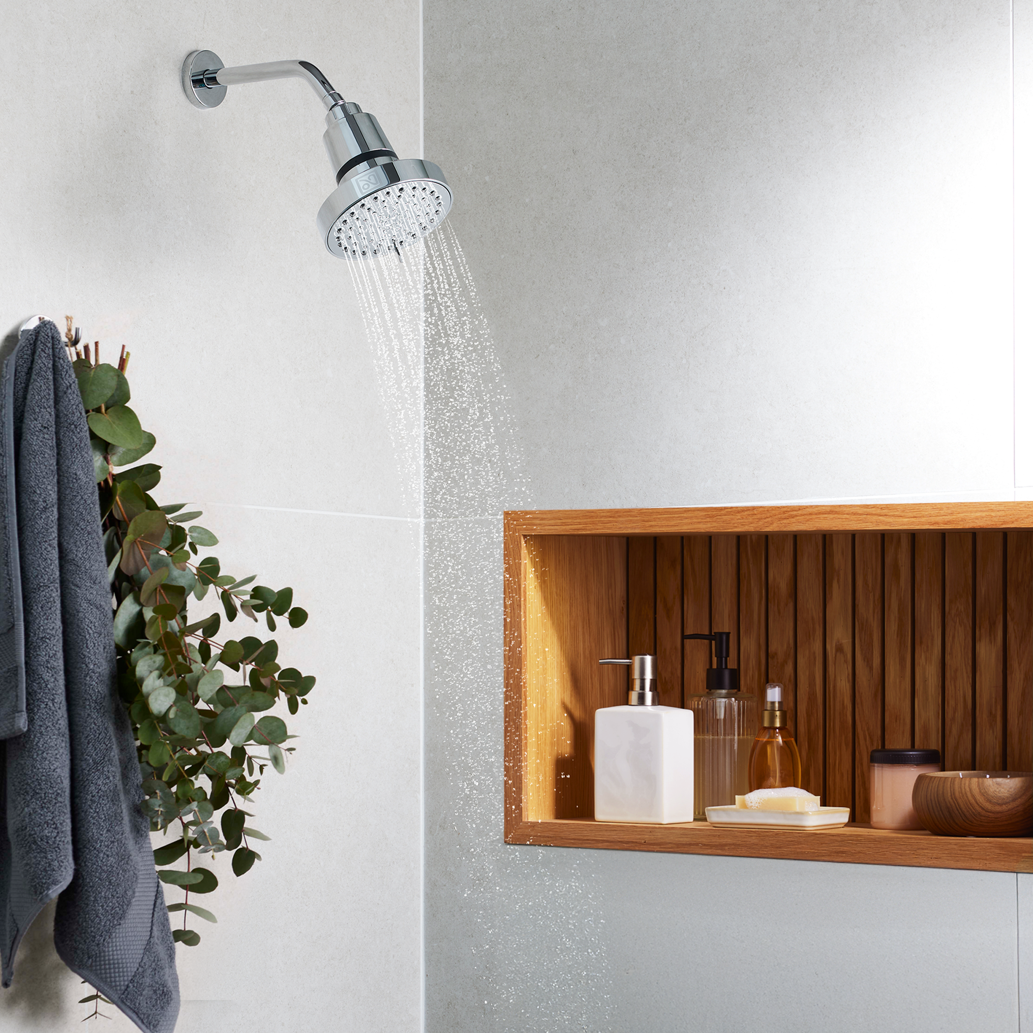Lifestyle imagery of filtered shower head product.