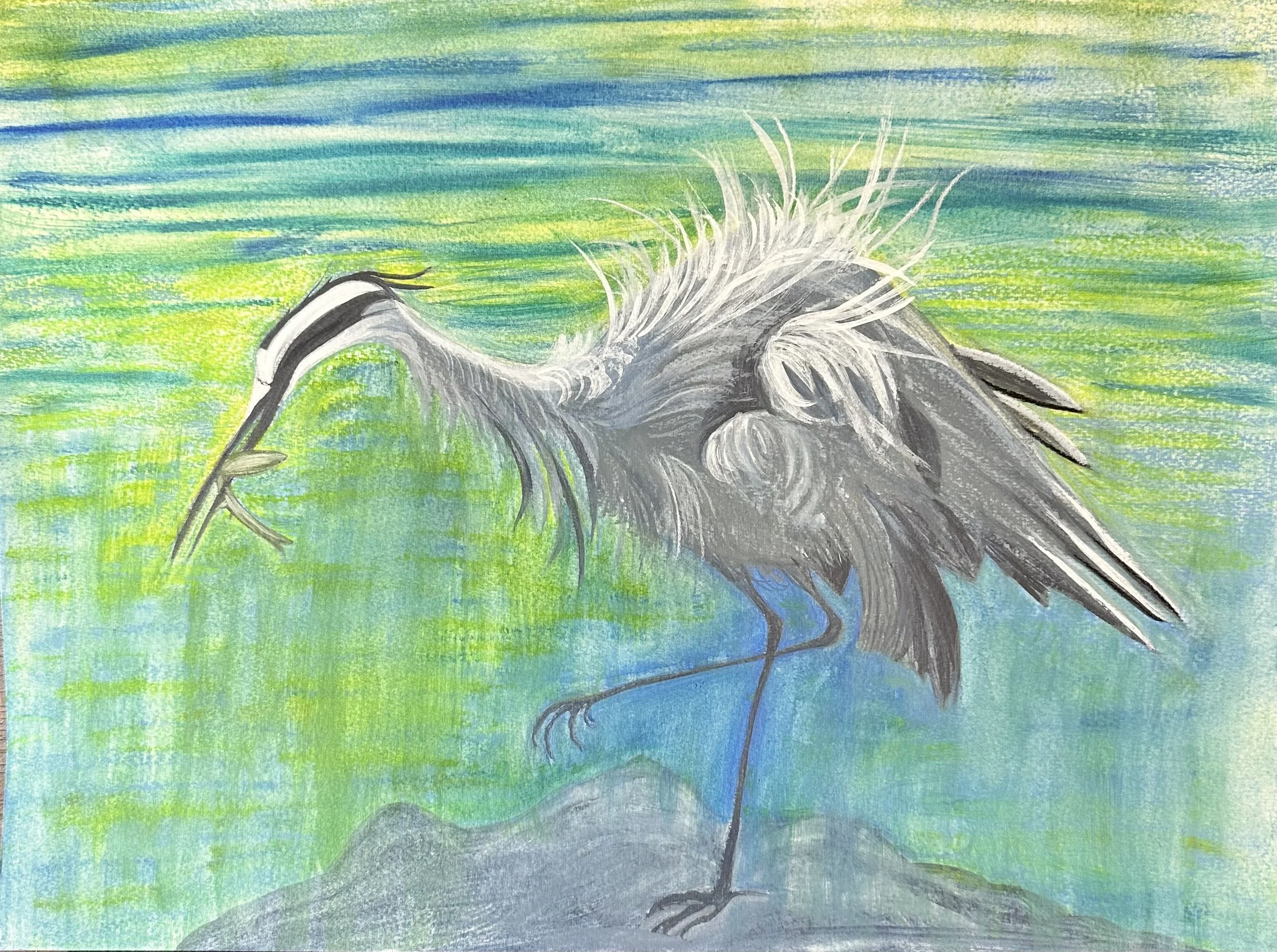 In the Shallows.
Derwent Inktense Watercolour Blocks on 400g paper, 12 x 16 inches.
Along Vancouver’s seawall, a great blue heron moves with poised precision, pausing mid-hunt in the dappled light of shallow waters. Rendered in vibrant Derwent Inkt