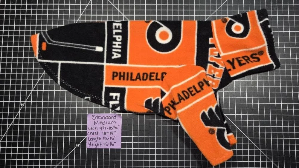 MEDIUM 2 LEG ORANGE FLEECE HOCKEY JAMMIE