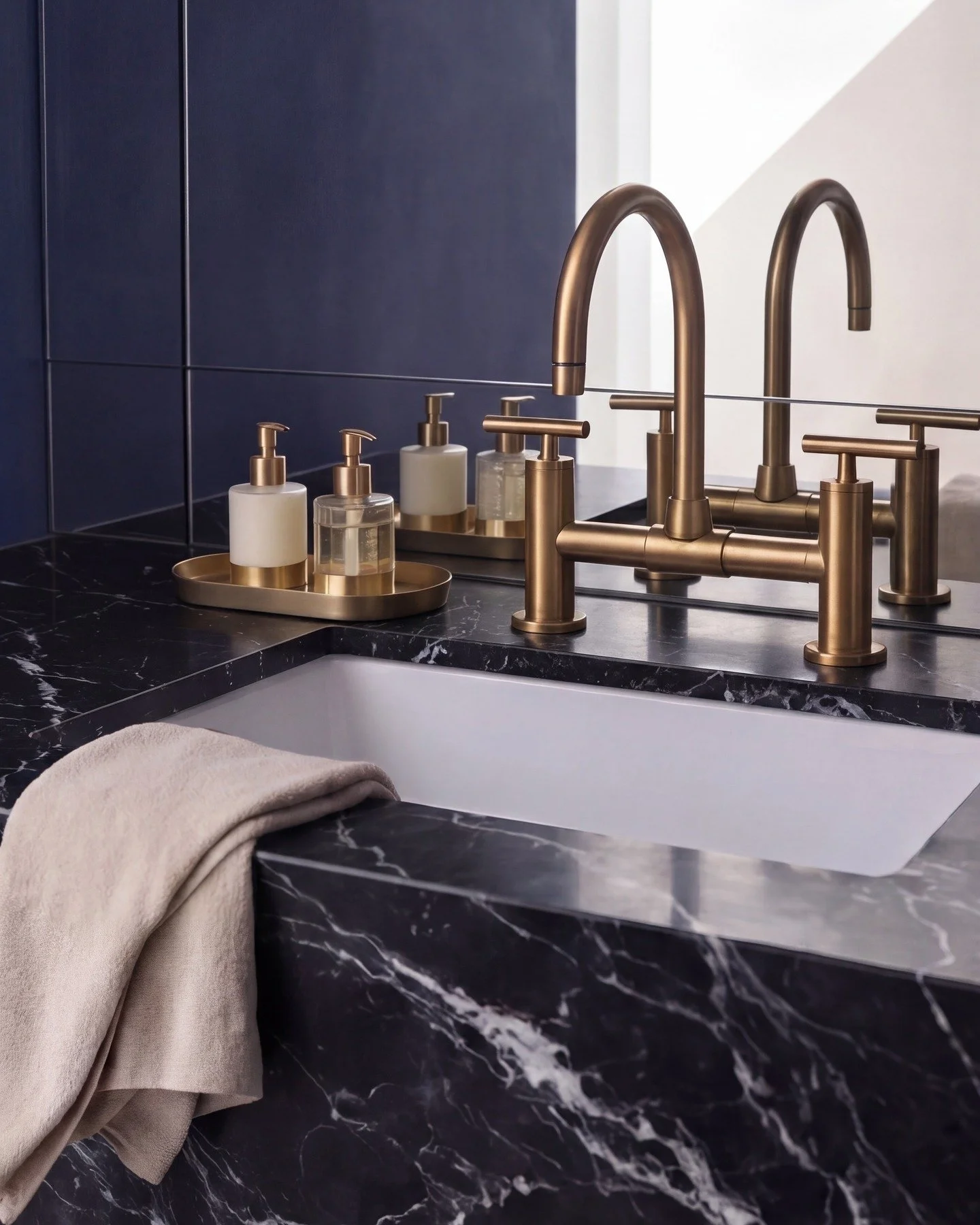 Clean, modern, and built to stand out.

This custom powder room features a bold stone vanity, warm brass fixtures, and a refined finish that ties everything together. Thoughtful design, precise execution, and materials that elevate the entire space.
