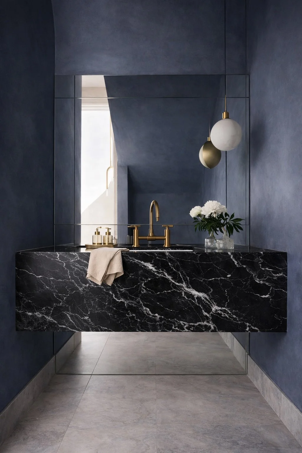 Elegant bathroom with black marble vanity.jpg