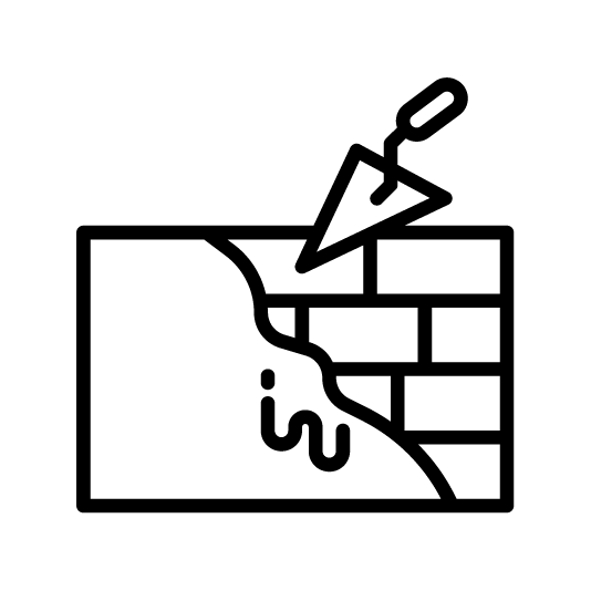 A black silhouette of a cartoon cat sitting upright with a smiling expression and a curled tail.