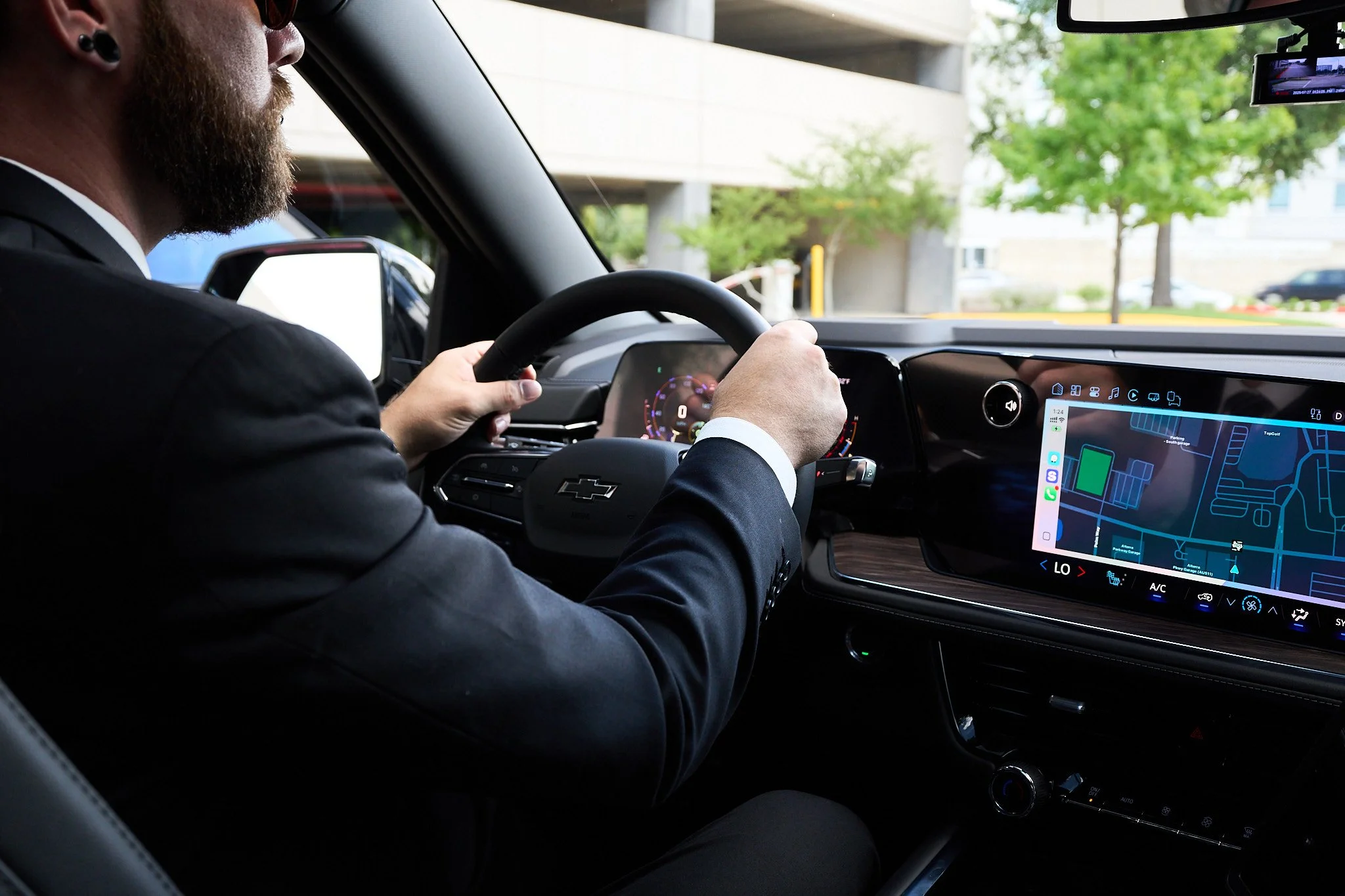 Driver at wheel in luxury SUV