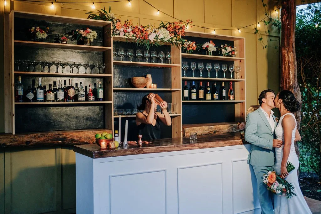 Bar Station with Bride & Groom kissing.jpg